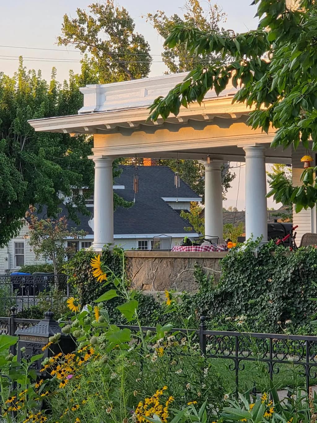 Garden gazebo surrounded by sunflowers and ivy near Susanville
