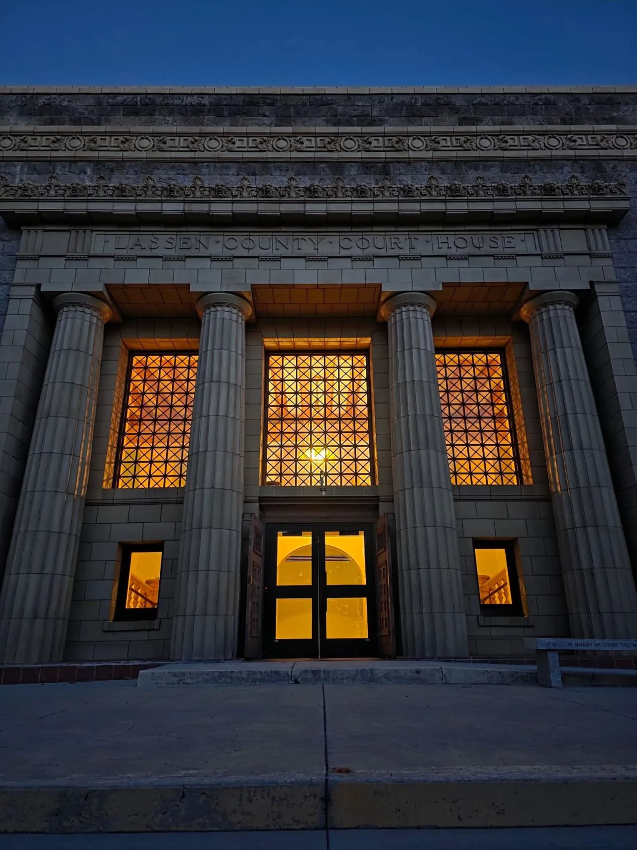 Lassen County Court House columns facade lit at night in Susanville